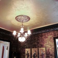 Metallic silver and gold ceiling design